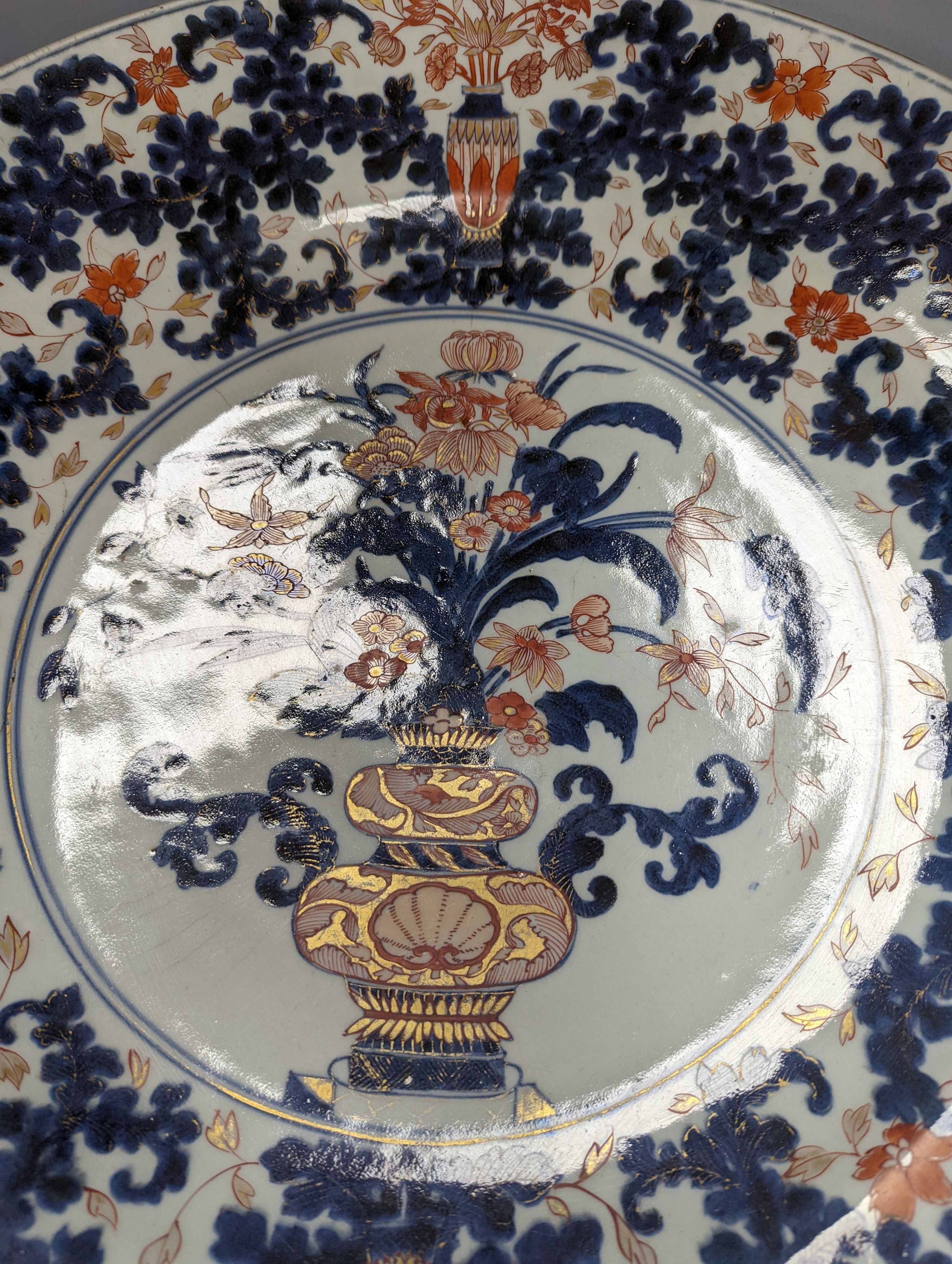 A large 17th/18th century Japanese Arita Imari palette charger, 55cm